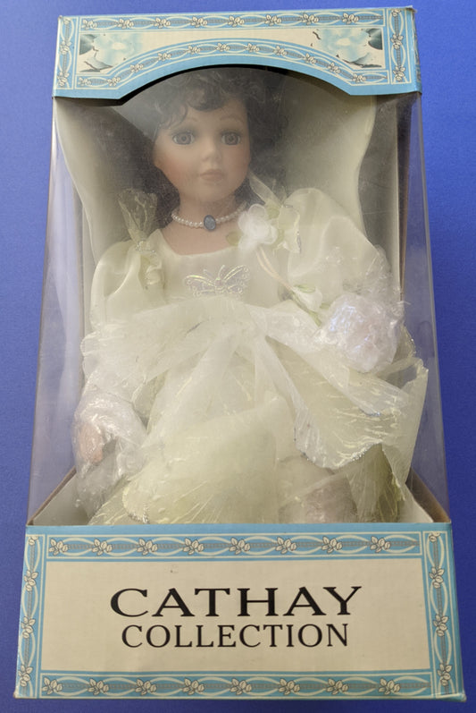 Cathay Collection Genuine "Swinging Angel" Porcelain Doll (Unopened)